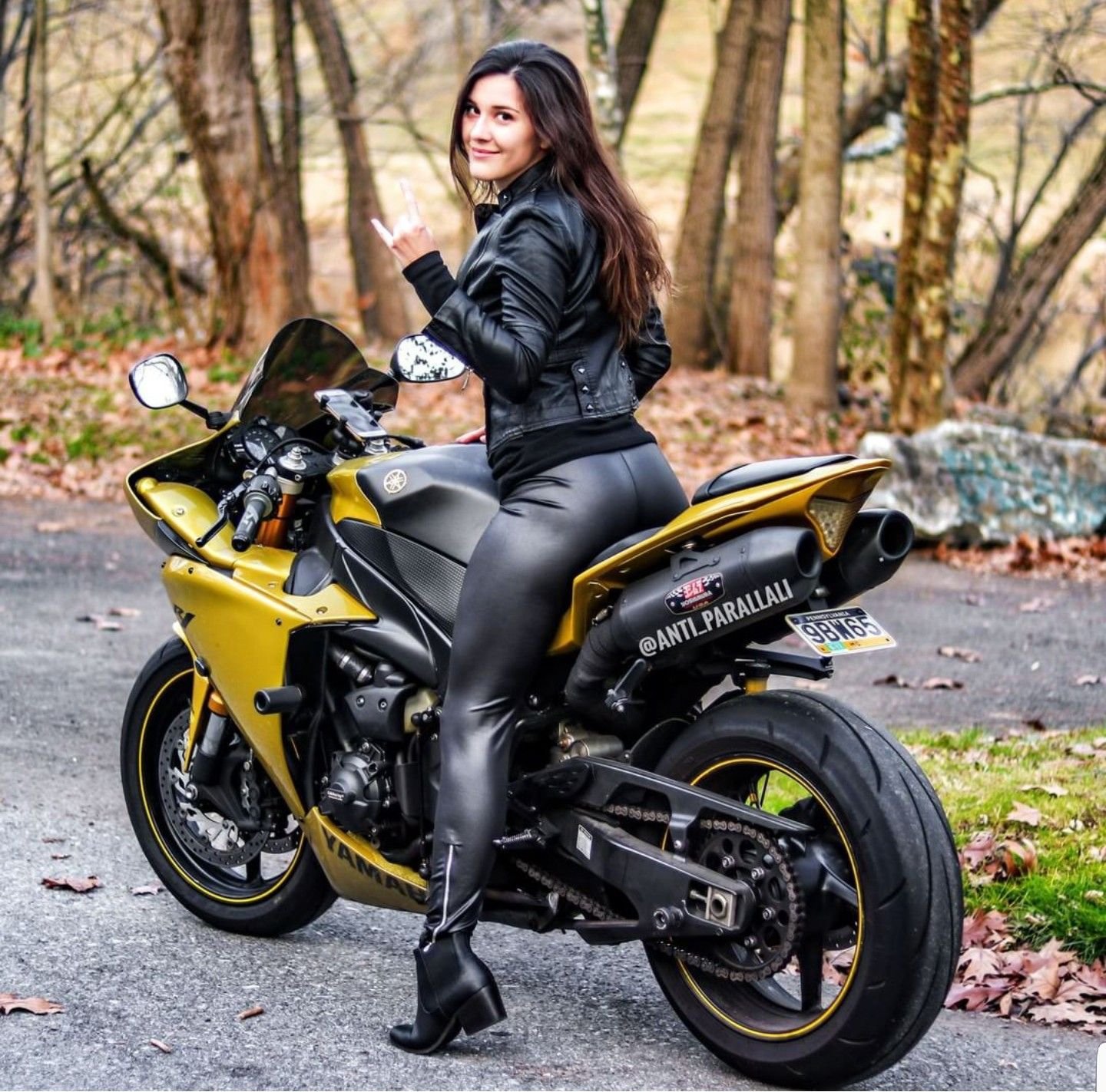 Sexy girl Brunettes on a motorcycle in Fuxin